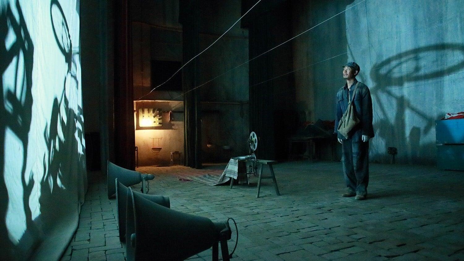 Cinematic background from One Second 2020 - A movie fan escapes from a labour camp during the Chinese Cultural Revolution and strikes up a relationship with a homeless female vagabond.