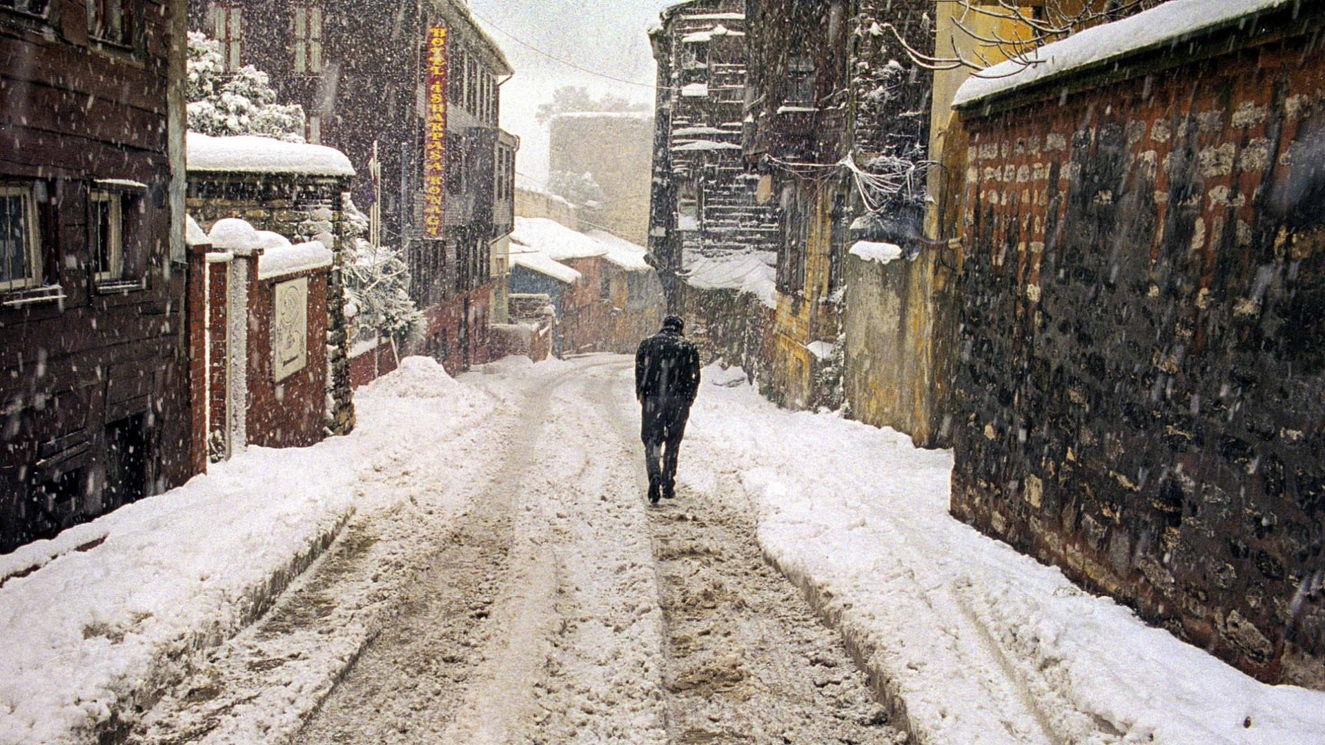 Cinematic background from Distant 2002 - Uzak/Distant chronicles the numbing loneliness, longing, and isolation in the lives of two men who are consumed by their own problems. Istanbul photographer Mahmut reluctantly receives his relative Yusuf, but the mingling of their lives does little to alleviate their detachment.