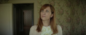 Movie still from “Hateship Loveship” (2013), directed by Liza Johnson – A person with long red hair; Close Up shot, Low angle