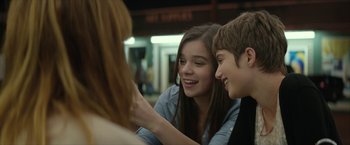 Movie still from “Hateship Loveship” (2013), directed by Liza Johnson – A couple of people sitting next to each other; Close Up shot, Over the shoulder angle