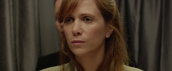 Movie still from “Hateship Loveship” (2013), directed by Liza Johnson – A person with long red hair; Close Up shot, Over the shoulder angle