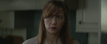 Movie still from “Hateship Loveship” (2013), directed by Liza Johnson – A person with long red hair; Close Up shot, Over the shoulder angle