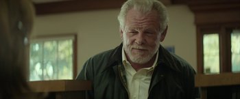 Movie still from “Hateship Loveship” (2013), directed by Liza Johnson – An older man with a white beard and a green jacket; Close Up shot, Low angle