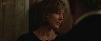 Movie still from “Hateship Loveship” (2013), directed by Liza Johnson – A person with short hair; Close Up shot, Over the shoulder angle