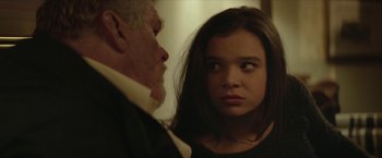 Movie still from “Hateship Loveship” (2013), directed by Liza Johnson – An older man and a young woman looking at each other; Close Up shot, Over the shoulder angle