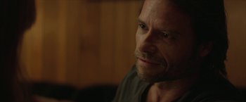 Movie still from “Hateship Loveship” (2013), directed by Liza Johnson – A person looking at the camera; Close Up shot, Over the shoulder angle