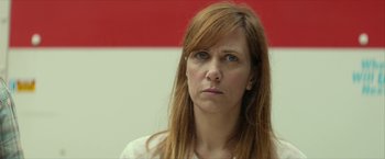Movie still from “Hateship Loveship” (2013), directed by Liza Johnson – A person with long red hair; Close Up shot, Low angle