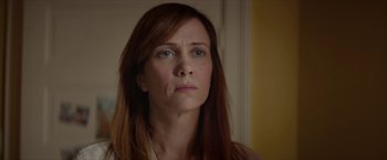 Movie still from “Hateship Loveship” (2013), directed by Liza Johnson – A person with long red hair; Close Up shot, Over the shoulder angle