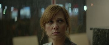 Movie still from “Hateship Loveship” (2013), directed by Liza Johnson – A person looking at the camera; Close Up shot, Over the shoulder angle