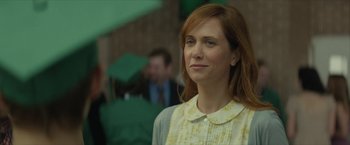 Movie still from “Hateship Loveship” (2013), directed by Liza Johnson – A person wearing a dress; Close Up shot, Over the shoulder angle