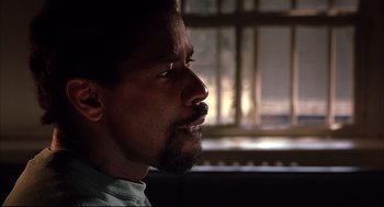 Movie still from “He Got Game” (1998), directed by Spike Lee – A person with a beard; Close Up shot, Over the shoulder angle