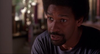 Movie still from “He Got Game” (1998), directed by Spike Lee – A person looking at the camera; Close Up shot, Over the shoulder angle