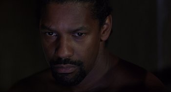 Movie still from “He Got Game” (1998), directed by Spike Lee – A person with a beard; Close Up shot, Over the shoulder angle