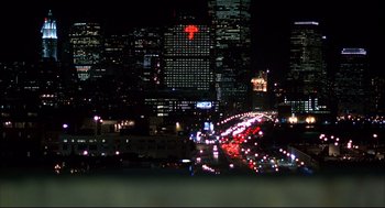 Movie still from “He Got Game” (1998), directed by Spike Lee – A view of a city at night from a distance; Extreme Wide shot, High angle