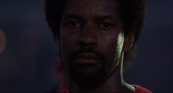 Movie still from “He Got Game” (1998), directed by Spike Lee – A person with a beard; Close Up shot, Low angle