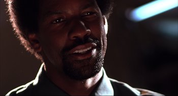 Movie still from “He Got Game” (1998), directed by Spike Lee – A man's face with a beard; Close Up shot, Low angle
