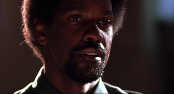 Movie still from “He Got Game” (1998), directed by Spike Lee – A person with a beard; Close Up shot, Low angle
