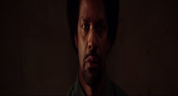 Movie still from “He Got Game” (1998), directed by Spike Lee – A person wearing a shirt; Close Up shot, Low angle