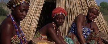 Movie still from “He's Just Not That Into You” (2009), directed by Ken Kwapis – A woman sitting in front of a wooden structure; Close Up shot, Low angle