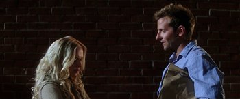 Movie still from “He's Just Not That Into You” (2009), directed by Ken Kwapis – A man and a woman standing next to each other; Medium shot, Over the shoulder angle
