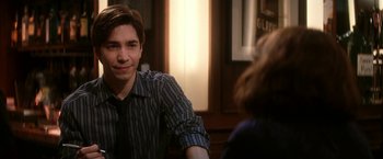 Movie still from “He's Just Not That Into You” (2009), directed by Ken Kwapis – A man sitting at a table with a woman in front of him; Close Up shot, Over the shoulder angle