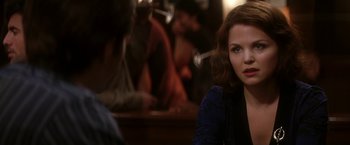 Movie still from “He's Just Not That Into You” (2009), directed by Ken Kwapis – A woman sitting in front of a mirror in a room; Close Up shot, Over the shoulder angle