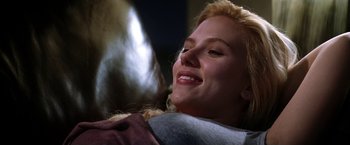 Movie still from “He's Just Not That Into You” (2009), directed by Ken Kwapis – A woman smiles while hugging a man; Close Up shot, Low angle