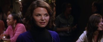 Movie still from “He's Just Not That Into You” (2009), directed by Ken Kwapis – A person wearing a blue jacket; Close Up shot, Over the shoulder angle