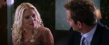 Movie still from “He's Just Not That Into You” (2009), directed by Ken Kwapis – A man and a woman sitting next to each other; Close Up shot, Over the shoulder angle