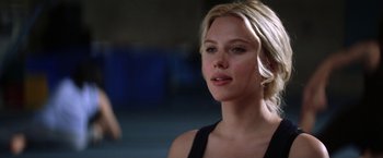 Movie still from “He's Just Not That Into You” (2009), directed by Ken Kwapis – A person wearing a black shirt; Close Up shot, Over the shoulder angle