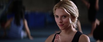 Movie still from “He's Just Not That Into You” (2009), directed by Ken Kwapis – A beautiful young blond woman wearing a black top; Close Up shot, Low angle