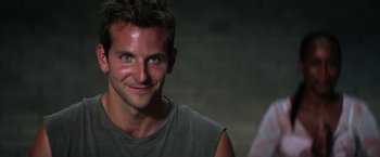 Movie still from “He's Just Not That Into You” (2009), directed by Ken Kwapis – A person smiling for the camera; Close Up shot, Over the shoulder angle