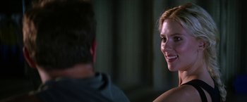 Movie still from “He's Just Not That Into You” (2009), directed by Ken Kwapis – A man and a woman are smiling at each other; Close Up shot, Over the shoulder angle