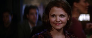 Movie still from “He's Just Not That Into You” (2009), directed by Ken Kwapis – A woman's face with a man in the background; Close Up shot, Over the shoulder angle