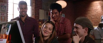 Movie still from “He's Just Not That Into You” (2009), directed by Ken Kwapis – A woman sitting in front of a man's ear; Medium shot, Over the shoulder angle