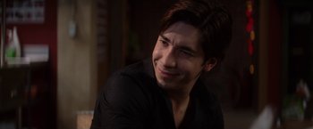 Movie still from “He's Just Not That Into You” (2009), directed by Ken Kwapis – A person wearing a black shirt; Close Up shot, Over the shoulder angle