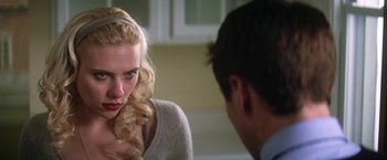 Movie still from “He's Just Not That Into You” (2009), directed by Ken Kwapis – A man and a woman sitting in front of each other in a room; Close Up shot, Over the shoulder angle