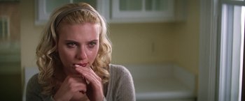 Movie still from “He's Just Not That Into You” (2009), directed by Ken Kwapis – A blonde woman with her hand to her face; Close Up shot, Over the shoulder angle