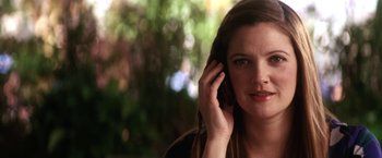 Movie still from “He's Just Not That Into You” (2009), directed by Ken Kwapis – A person talking on a cell phone; Close Up shot, Low angle