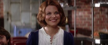 Movie still from “He's Just Not That Into You” (2009), directed by Ken Kwapis – A person with short brown hair; Close Up shot, Over the shoulder angle