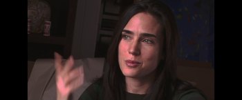 Movie still from “He's Just Not That Into You” (2009), directed by Ken Kwapis – A person holding a cell phone; Close Up shot, Over the shoulder angle