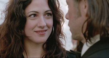 Movie still from “Head-On” (2004), directed by Fatih Akin – A person with long hair looking at a person with long dark hair; Close Up shot, Over the shoulder angle