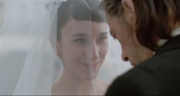 Movie still from “Head-On” (2004), directed by Fatih Akin – A bride and groom are looking into each others eyes; Close Up shot, Over the shoulder angle