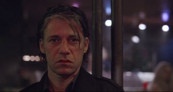 Movie still from “Head-On” (2004), directed by Fatih Akin – A person with long hair; Close Up shot, Low angle