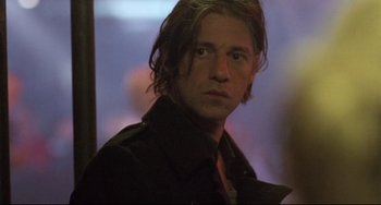 Movie still from “Head-On” (2004), directed by Fatih Akin – A person with long hair; Close Up shot, Low angle