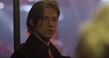 Movie still from “Head-On” (2004), directed by Fatih Akin – A person with long hair; Close Up shot, Low angle