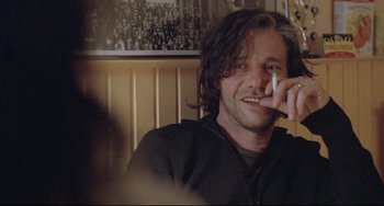 Movie still from “Head-On” (2004), directed by Fatih Akin – A person talking on a cell phone; Close Up shot, Low angle