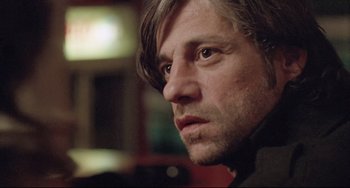 Movie still from “Head-On” (2004), directed by Fatih Akin – A person with long hair; Close Up shot, Low angle