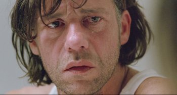 Movie still from “Head-On” (2004), directed by Fatih Akin – A person with long hair; Extreme Close Up shot, Low angle