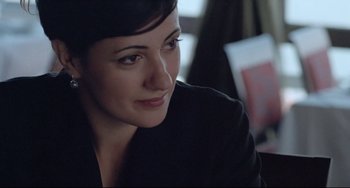 Movie still from “Head-On” (2004), directed by Fatih Akin – A person sitting in a room; Close Up shot, Over the shoulder angle